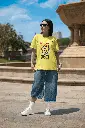 bella-canvas-t-shirt-mockup-featuring-a-woman-with-sunglasses-posing-near-a-fountain-m40208.webp